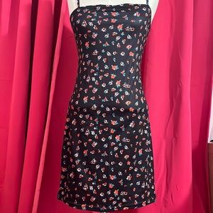 A black floral dress that was never worn.